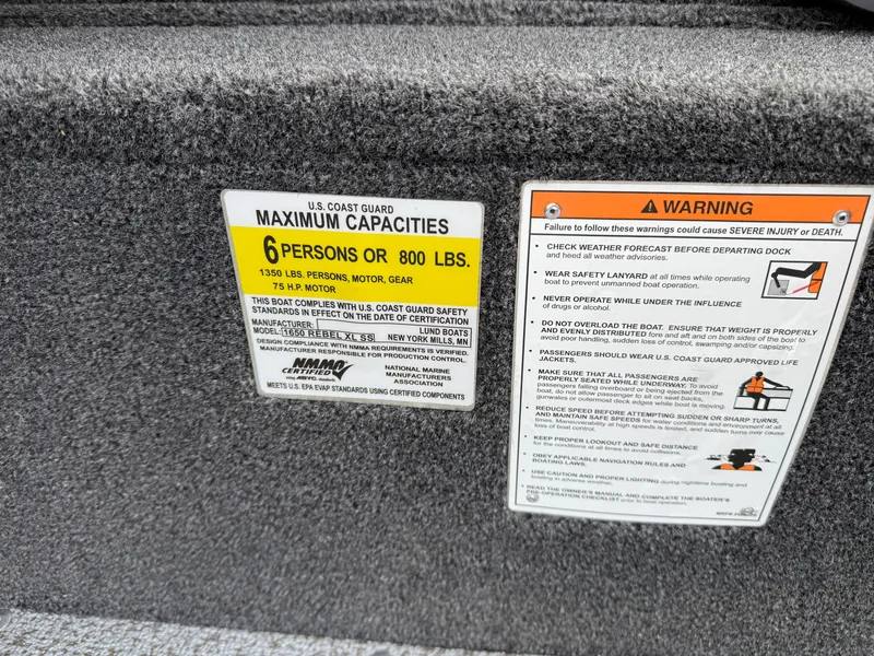 Slide: The Image of Capacity warning labels on 2025 Lund 1650 Rebel XL SS boat, indicating 6 persons or 800 lbs limit. - 16