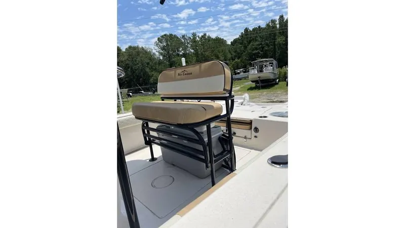 Slide: The Image of 2023 Sea Chaser 23 LX boat interior with seating and storage. - 4