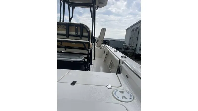 Slide: The Image of 2023 Sea Chaser 23 LX boat interior with seating and deck view. - 5