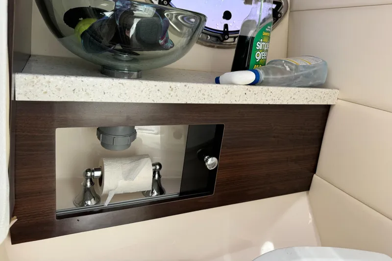 Slide: The Image of 2018 Regal 29 OBX bathroom interior with countertop and storage. - 17