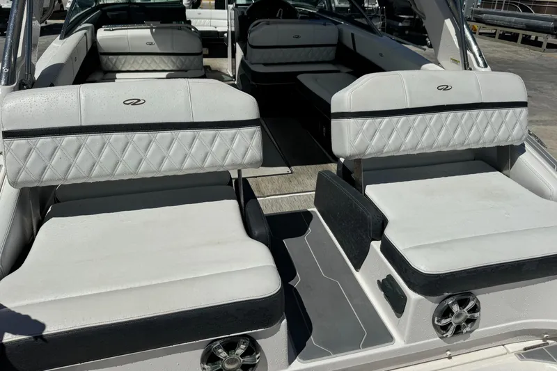 Slide: The Image of 2018 Regal 29 OBX boat interior with luxurious seating and modern design. - 2