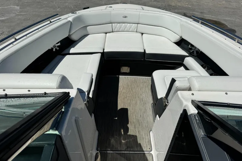 Slide: The Image of 2018 Regal 29 OBX boat interior with spacious seating and modern design. - 23