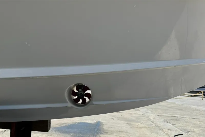 Slide: The Image of 2018 Regal 29 OBX boat hull with visible thruster detail. - 35