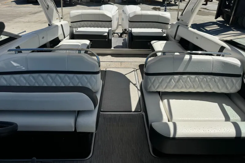 Slide: The Image of 2018 Regal 29 OBX boat interior with luxurious seating and modern design. - 5
