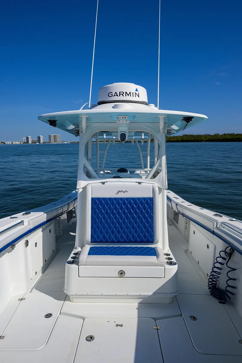 Slide: The Image of 2019 Yellowfin 34 Center Console boat on water, featuring Garmin equipment. - 14