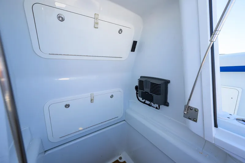 Slide: The Image of 2019 Yellowfin 34 Center Console interior storage compartments and equipment. - 17