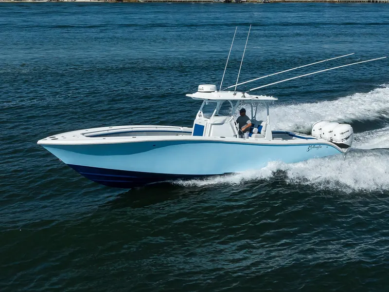 Slide: The Image of 2019 Yellowfin 34 Center Console boat cruising on open water. - 3