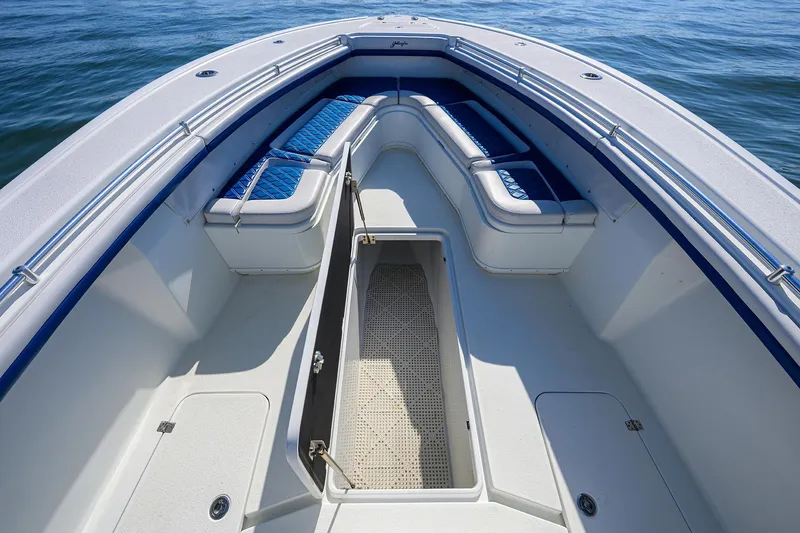 Slide: The Image of 2019 Yellowfin 34 Center Console boat interior with seating and storage compartments. - 8