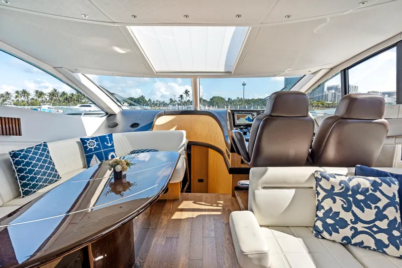Slide: The Image of Luxurious interior of 2014 Sunseeker 68 Sport Yacht with elegant seating and scenic views. - 12