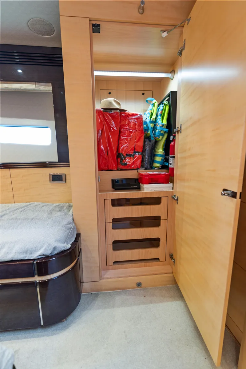 Slide: The Image of Interior storage of 2014 Sunseeker 68 Sport Yacht with safety equipment. - 14