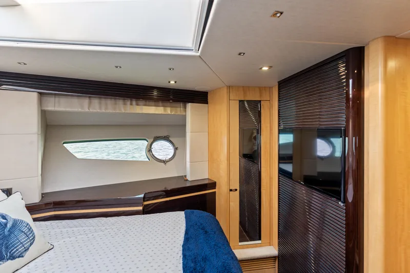 Slide: The Image of Luxurious interior of 2014 Sunseeker 68 Sport Yacht with elegant wood finishes and modern design. - 25