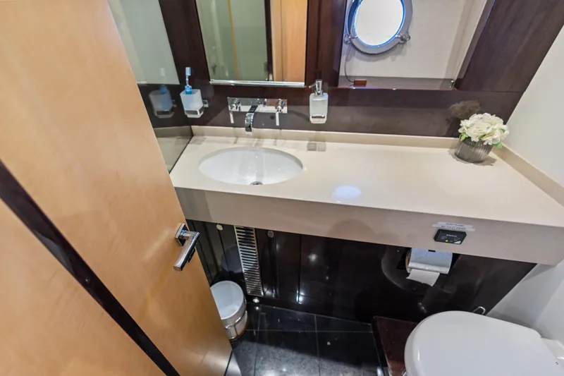 Slide: The Image of Luxurious bathroom in 2014 Sunseeker 68 Sport Yacht with modern fixtures and elegant design. - 26