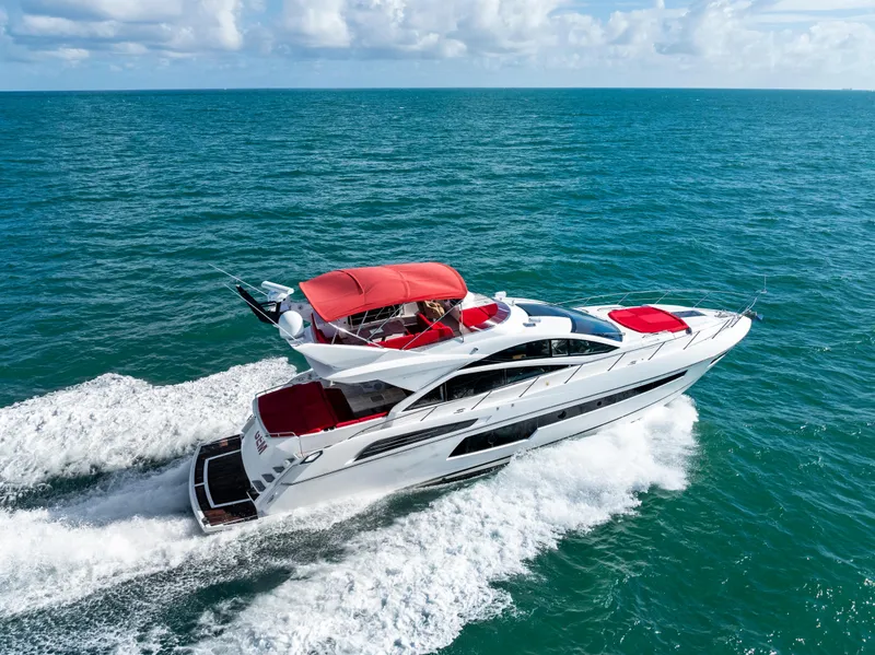 Slide: The Image of Luxurious interior of 2014 Sunseeker 68 Sport Yacht with elegant seating and panoramic windows. - 4