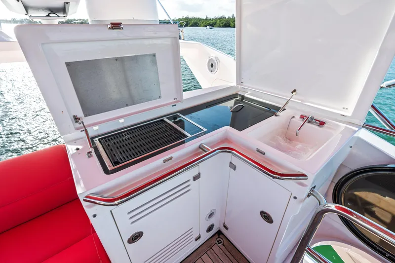 Slide: The Image of Outdoor kitchen on 2014 Sunseeker 68 Sport Yacht with grill and sink. - 43