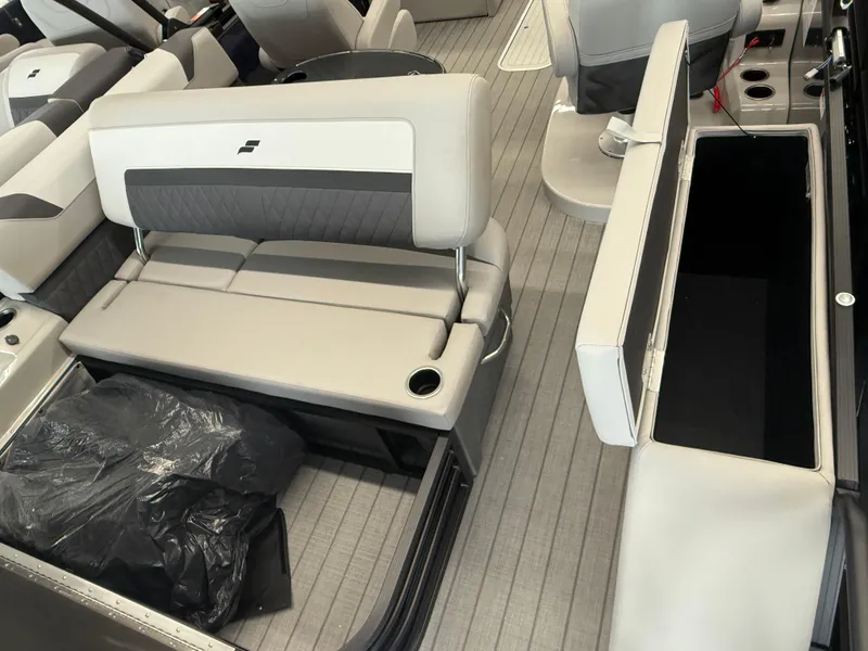 Slide: The Image of Interior of 2025 Starcraft SLS 3 Q DH boat with seating and storage compartments. - 2