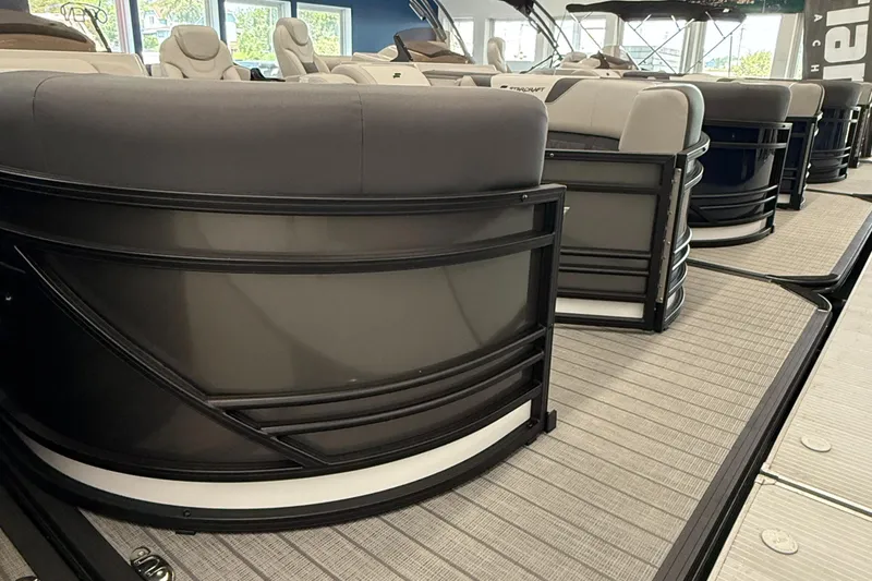 Slide: The Image of 2025 Starcraft SLS 3 Q DH pontoon boat interior with plush seating and modern design. - 1
