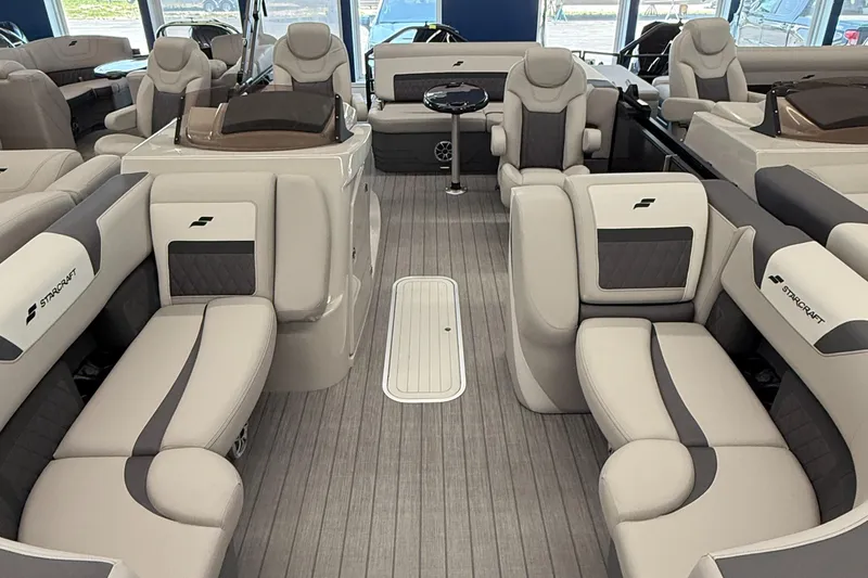 Slide: The Image of Luxurious interior of 2025 Starcraft SLS 3 Q DH pontoon boat with plush seating. - 3