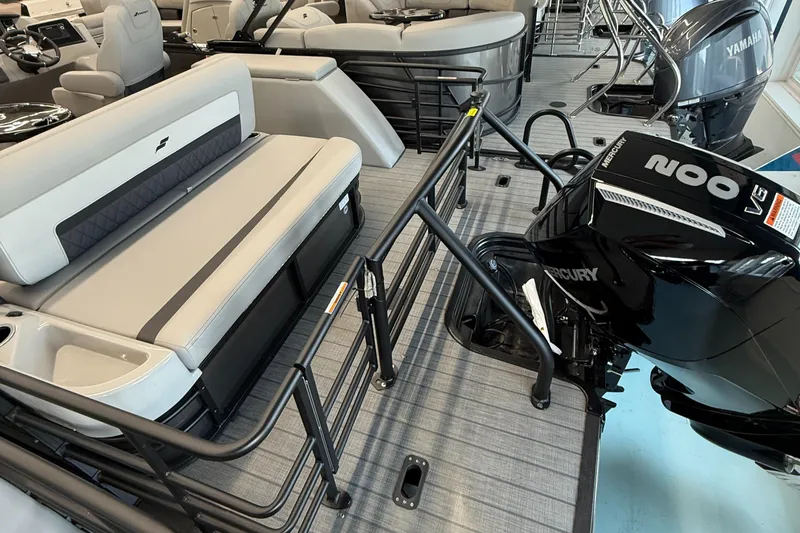 Slide: The Image of 2025 Starcraft SLS 3 Q DH boat interior with seating and Mercury outboard motor. - 4