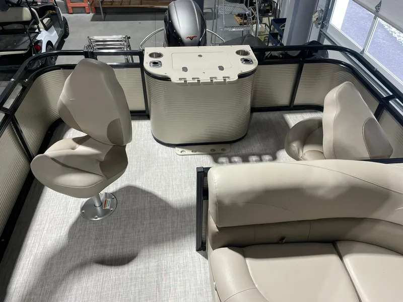 Slide: The Image of 2019 Avalon Lsz Rear Fish 24' boat interior with beige seating and fishing station. - 11
