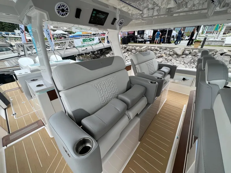 Slide: The Image of Luxurious interior of 2026 Regal 50 SAV boat with plush seating and modern amenities. - 13