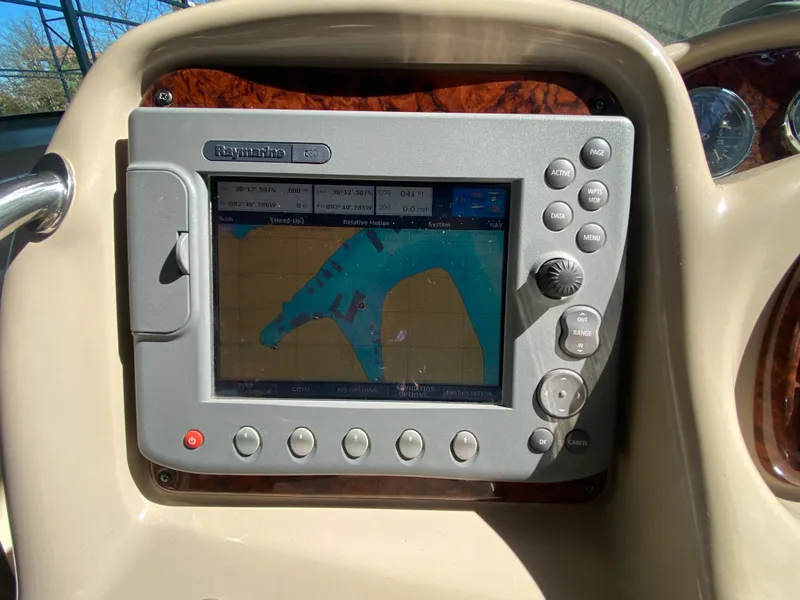 Slide: The Image of 2003 Sea Ray 340 Sundancer navigation system with Raymarine display. - 15
