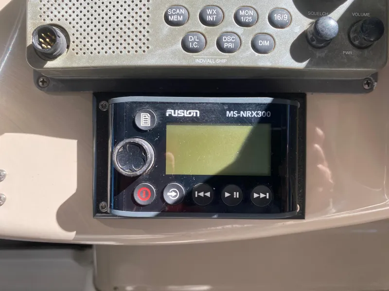 Slide: The Image of Fusion MS-NRX300 marine stereo on 2003 Sea Ray 340 Sundancer dashboard. - 17