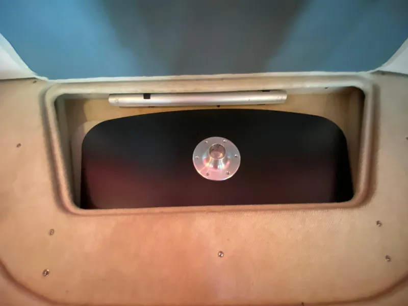 Slide: The Image of Storage compartment in a 2003 Sea Ray 340 Sundancer boat interior. - 40