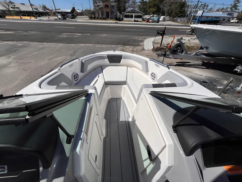 Slide: The Image of 2025 Chaparral 21 SSi OB boat interior with spacious seating and modern design. - 12