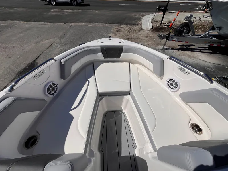 Slide: The Image of 2025 Chaparral 21 SSi OB boat interior with spacious seating and modern design. - 13