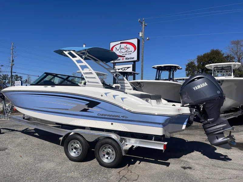 Slide: The Image of 2025 Chaparral 21 SSi OB boat with Yamaha outboard motor on trailer. - 3