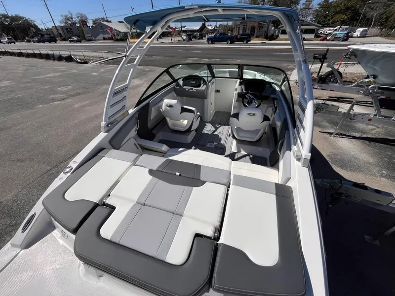 Slide: The Image of 2025 Chaparral 21 SSi OB boat with spacious seating and modern design. - 6