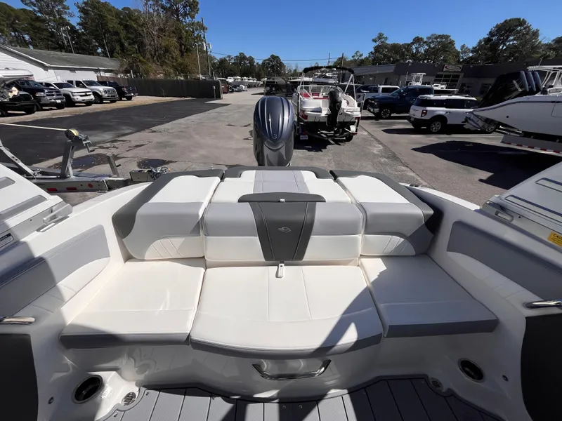 Slide: The Image of 2025 Chaparral 21 SSi OB boat interior with spacious seating and modern design. - 8