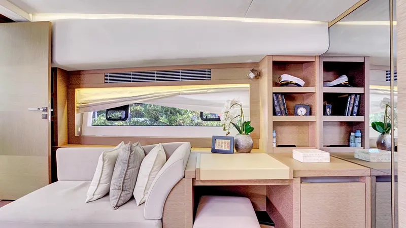 Slide: The Image of Luxurious interior of a 2018 Prestige 680 yacht with elegant seating and decor. - 16
