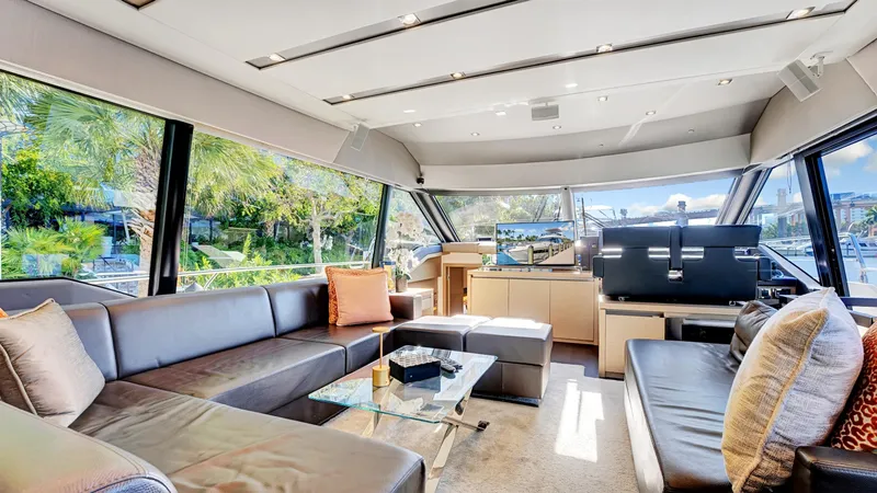 Slide: The Image of Luxurious interior of a 2018 Prestige 680 yacht with modern seating and panoramic windows. - 38