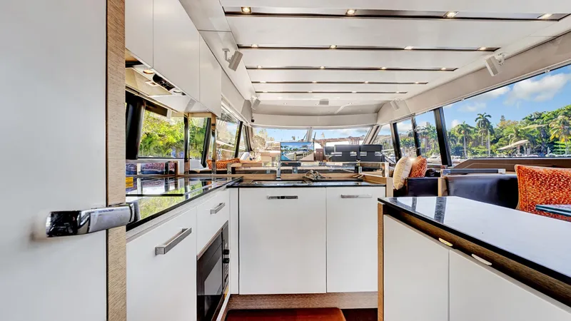 Slide: The Image of Luxurious interior of 2018 Prestige 680 yacht with modern kitchen and scenic views. - 43