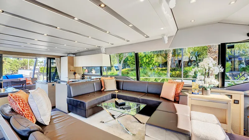 Slide: The Image of Luxurious interior of 2018 Prestige 680 yacht with modern seating and large windows. - 47