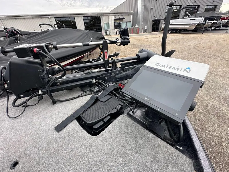 Slide: The Image of 2022 Bass Cat Cougar FTD boat with Garmin navigation system and trolling motor. - 9