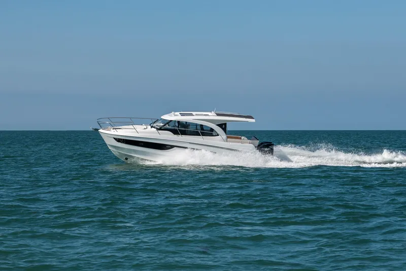 Slide: The Image of 2026 Beneteau Antares 11 OB cruising on open water. - 35