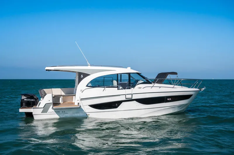 Slide: The Image of 2026 Beneteau Antares 11 OB boat cruising on open water. - 4