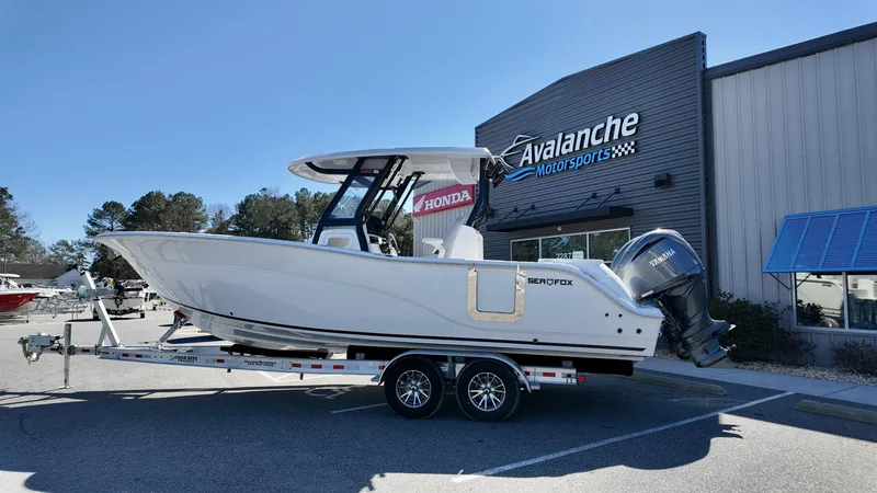 The Image of 2025 Sea Fox 288 Commander boat on trailer outside Avalanche Motorsports. - 0