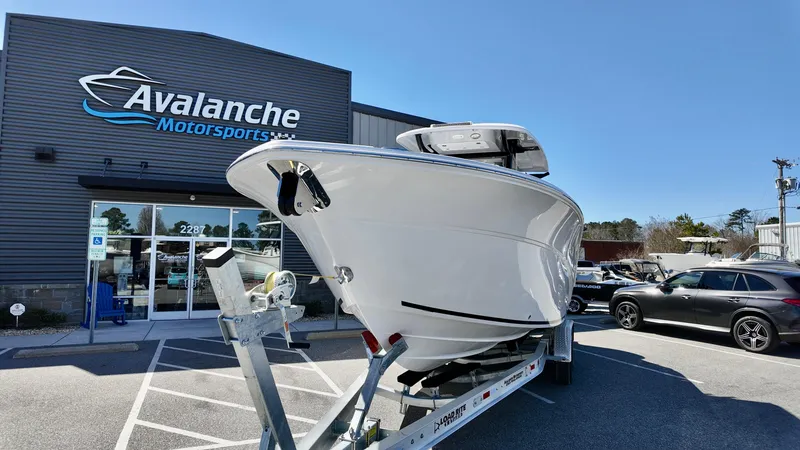 Slide: The Image of 2025 Sea Fox 288 Commander boat on trailer at Avalanche Motorsports dealership. - 2
