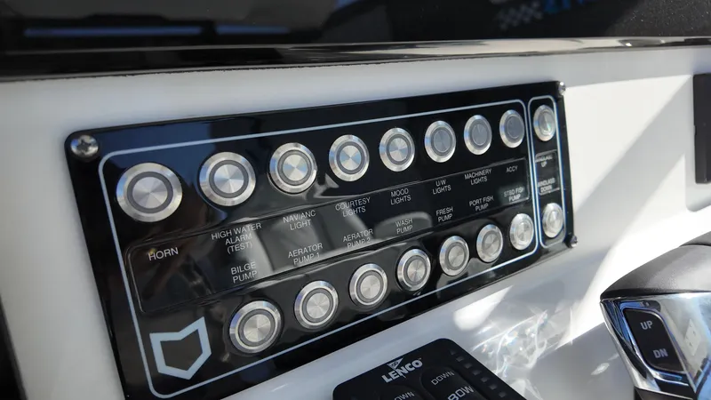 Slide: The Image of Control panel of 2025 Sea Fox 288 Commander boat with labeled buttons. - 6