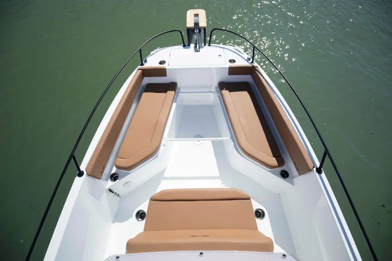 Slide: The Image of 2025 Beneteau Flyer 8 SPACEdeck boat with spacious seating and sleek design on water. - 7