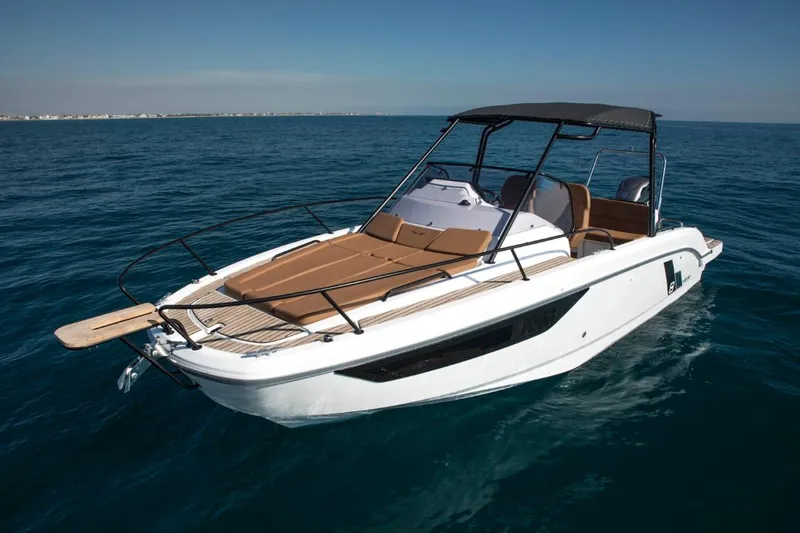 Slide: The Image of 2025 Beneteau Flyer 8 SUNdeck boat on calm ocean waters. - 3