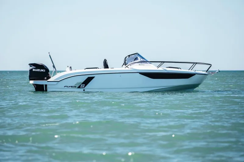 Slide: The Image of 2025 Beneteau Flyer 8 SUNdeck boat on calm sea with Suzuki engine. - 6
