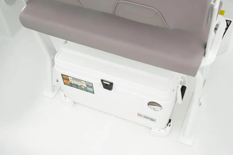 Slide: The Image of 2025 Wellcraft 202 Fisherman boat seat with integrated storage compartment. - 18