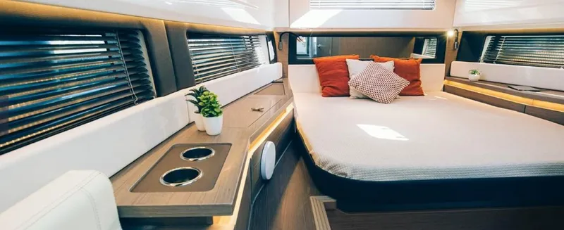 Slide: The Image of Luxurious interior of 2025 Wellcraft 38 Explorer yacht with modern design and cozy bedding. - 9