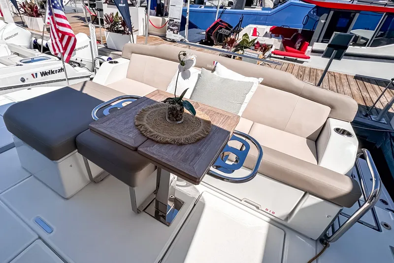 Slide: The Image of 2025 Wellcraft 44 Explorer yacht on open water, showcasing sleek design and powerful engines. - 43