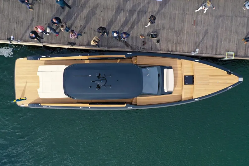 Slide: The Image of Aerial view of 2025 Windy SRL/SR60 luxury yacht docked at a wooden pier. - 14