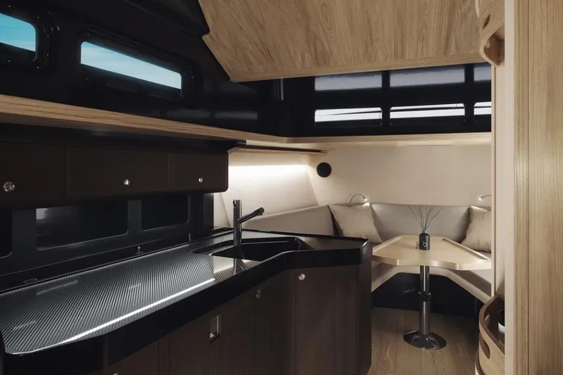 Slide: The Image of Luxurious interior of 2025 Windy SRL/SR60 yacht with modern kitchen and cozy seating area. - 6